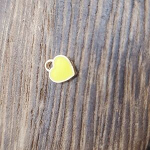 P133‎ tiny yellow charm heart